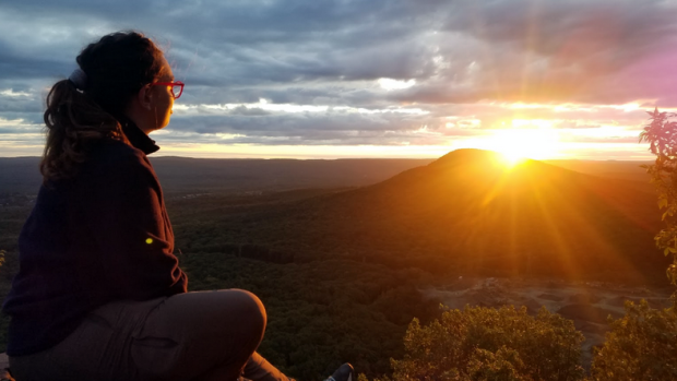 Sarah Paust ’20 atop Bare Mountain at sunrise