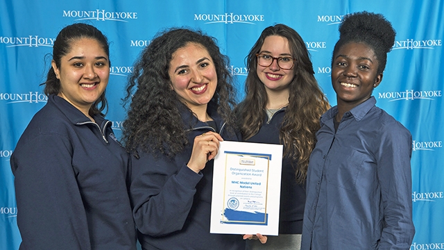 Board members of the Mount Holyoke Model United Nations pose with their Distinguished Student Organization Award citation (from left): Maham Khan '19, Marwa Mikati '17, Kim Foreiter '19 and Edith Amoafoa-Smart '19.