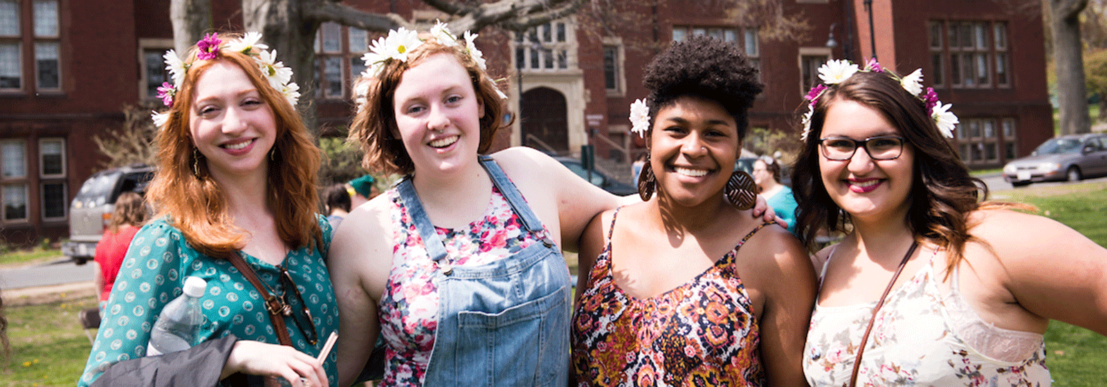 Photo of a group of students celebrating Pangy Day with flowers in their hair