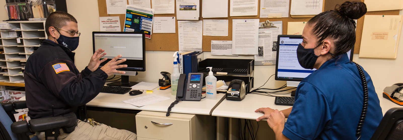 Two members of the public safety staff having a discussion